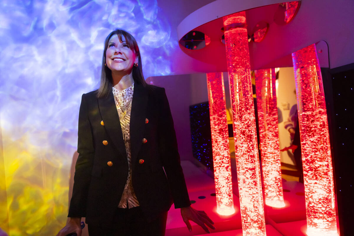 Melissa Kaiser, CEO of Discovery Children’s Museum, shows a relaxation area with ambient ...