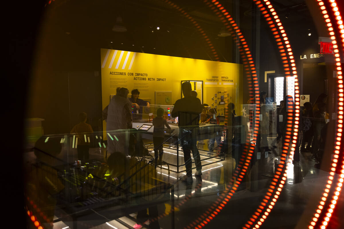 People explore the energy exhibit during a tour of the Discovery Children’s Museum on Tu ...