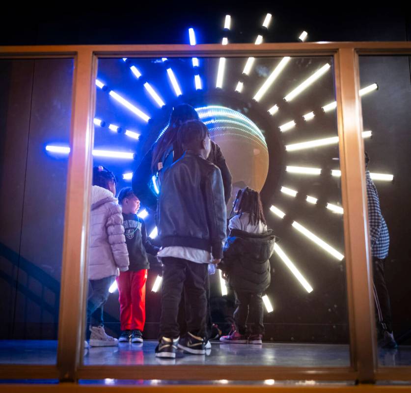 Children explore the energy exhibit during a tour of the Discovery Children’s Museum on ...