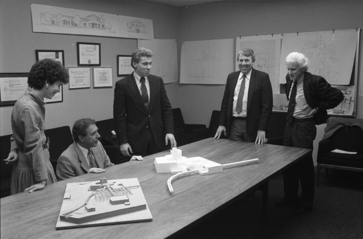 New Mexico architect Antoine Predock (white hair) presents his preliminary model and drawings o ...