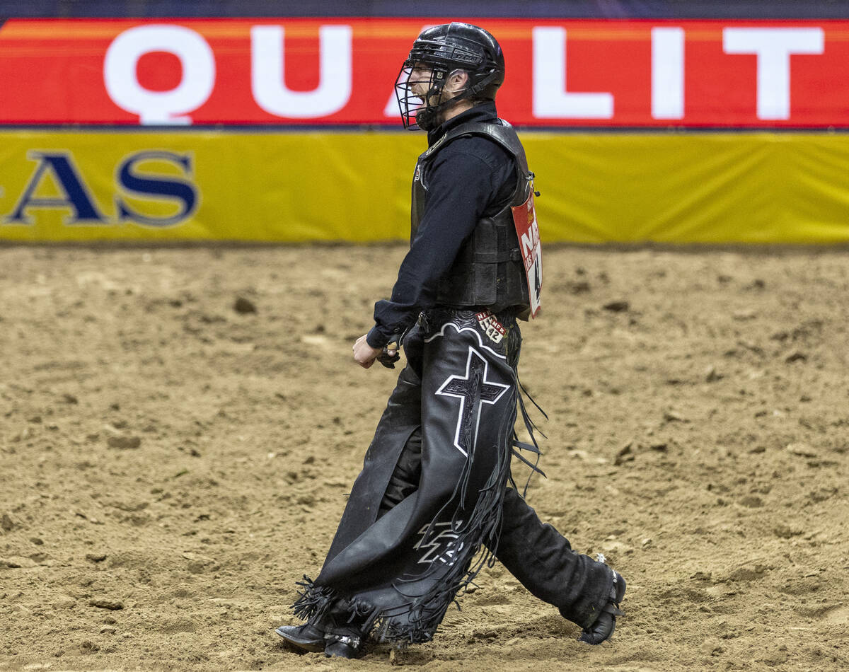 Trevor Reiste celebrates after competing in the bull riding event during day nine of the Nation ...