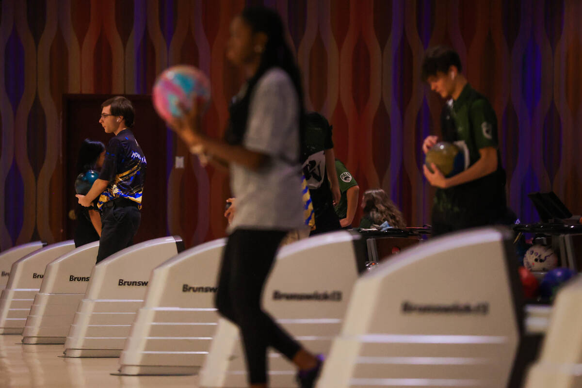 Students get ready to bowl during a high school bowling match at the Orleans on Dec. 13, 2024, ...