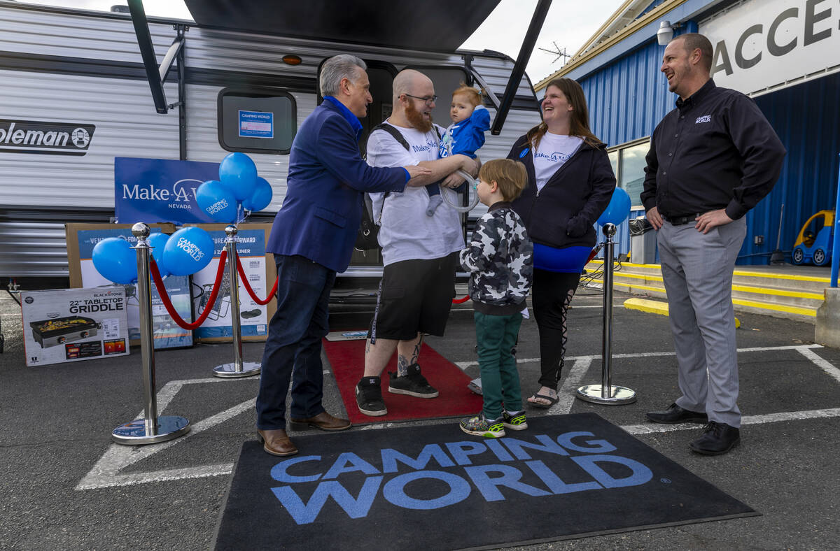 (From left) Make-A-Wish Nevada President/CEO Scott Rosenzweig chats with Dan King, Brooklyn, 2 ...