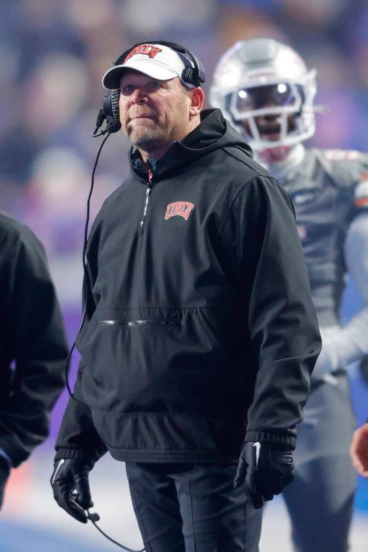 UNLV head coach Barry Odom looks up at the video board during a review against Boise State in t ...