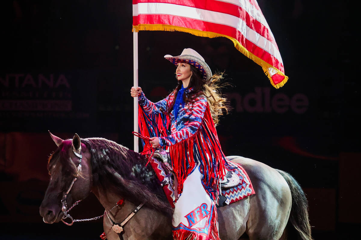 The American flag is presented during the national anthem during the final night of National Fi ...