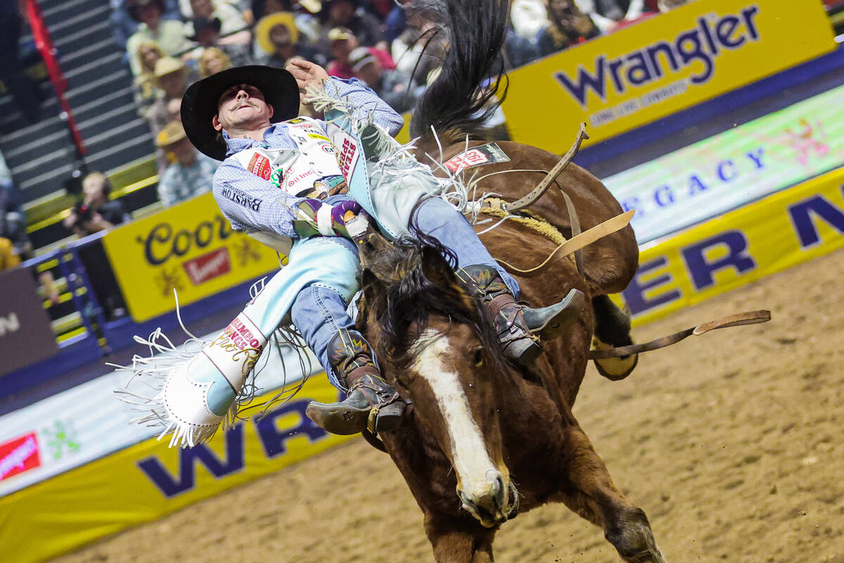 Bareback rider Keenan Hayes completes his last ride during the final night of National Finals R ...