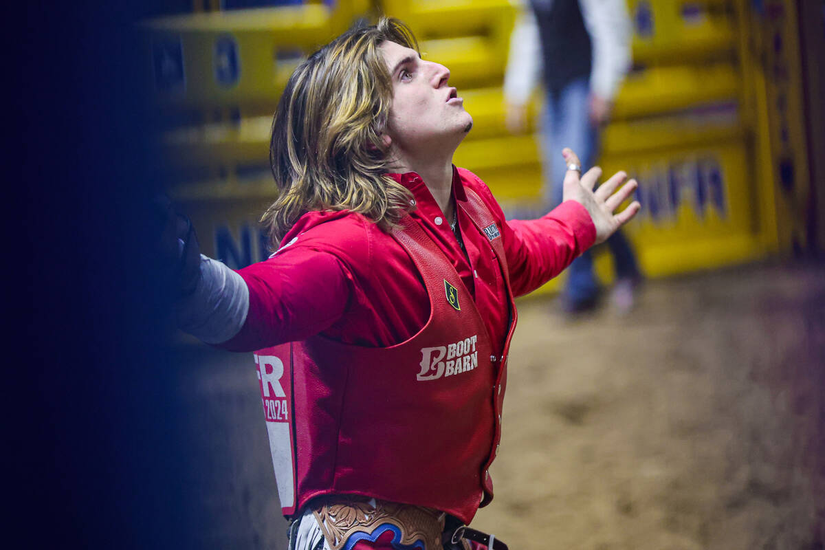 Bareback rider Rocker Steiner reacts to his score during the final night of National Finals Rod ...