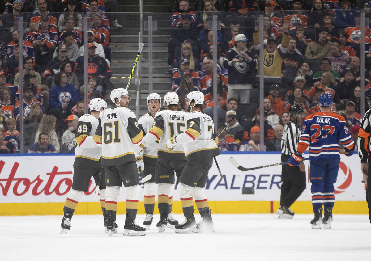 Vegas Golden Knights celebrate a goal against the Edmonton Oilers during the second period of a ...