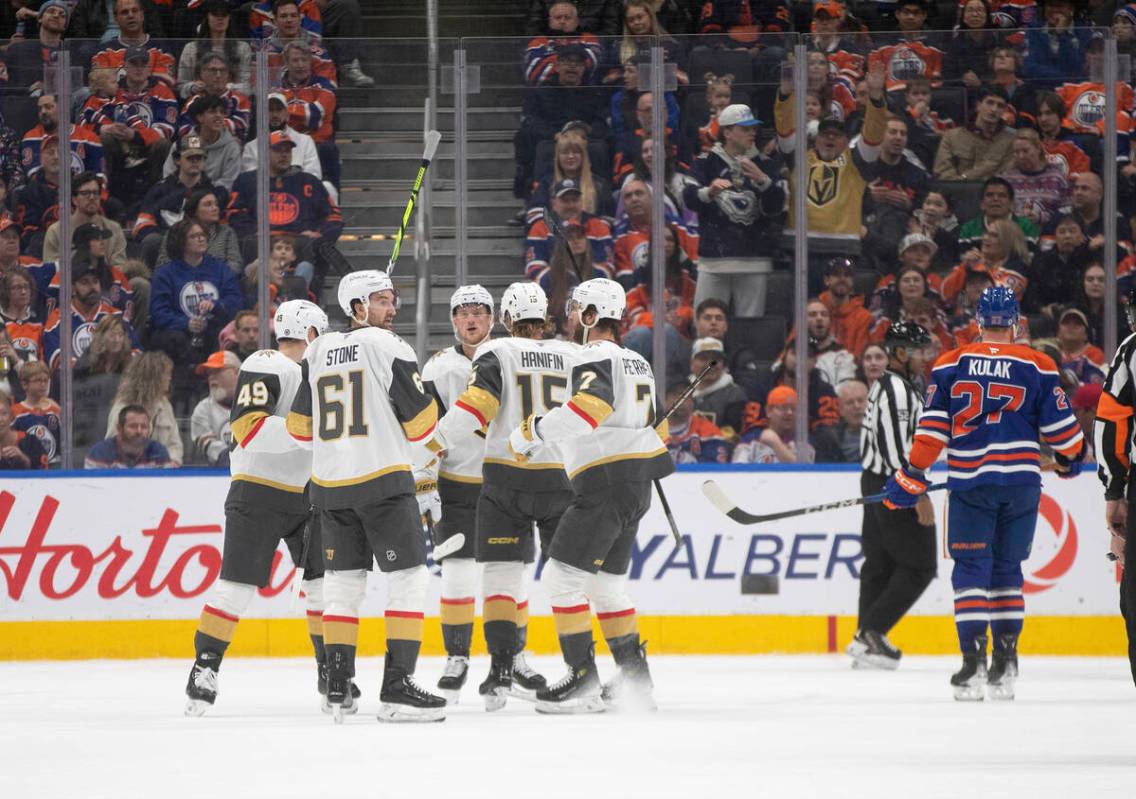 Vegas Golden Knights celebrate a goal against the Edmonton Oilers during the second period of a ...