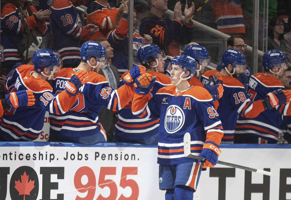 Edmonton Oilers' Ryan Nugent-Hopkins (93) celebrate a goal against the Vegas Golden Knights dur ...