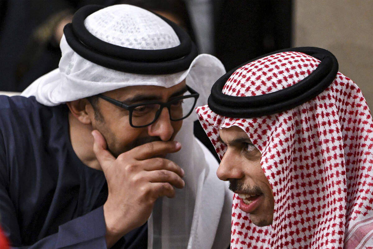 The UAE's Foreign Minister Sheikh Abdullah bin Zayed al-Nahyan, left, speaks with Saudi Arabia' ...