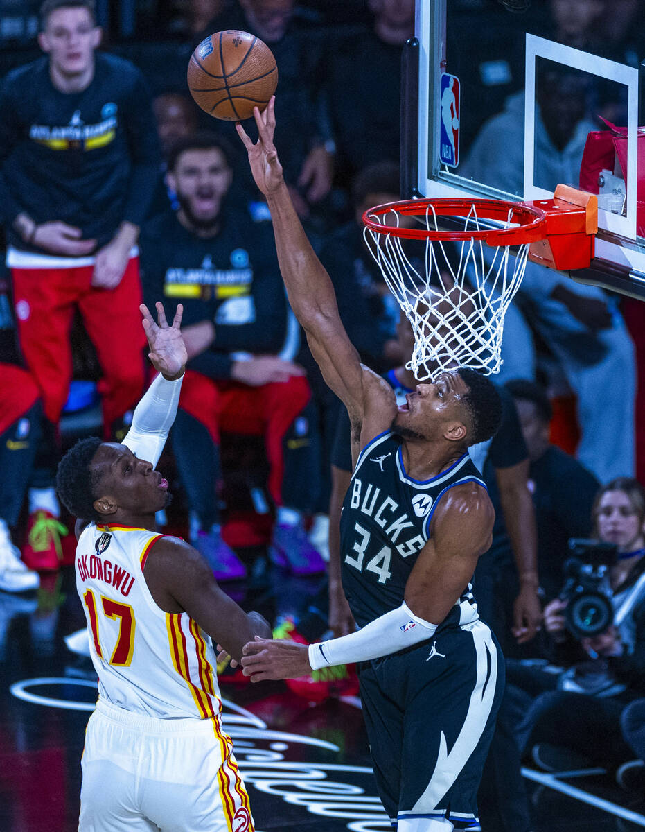 Atlanta Hawks forward Onyeka Okongwu (17) has a shot blocked b y Milwaukee Bucks forward Gianni ...