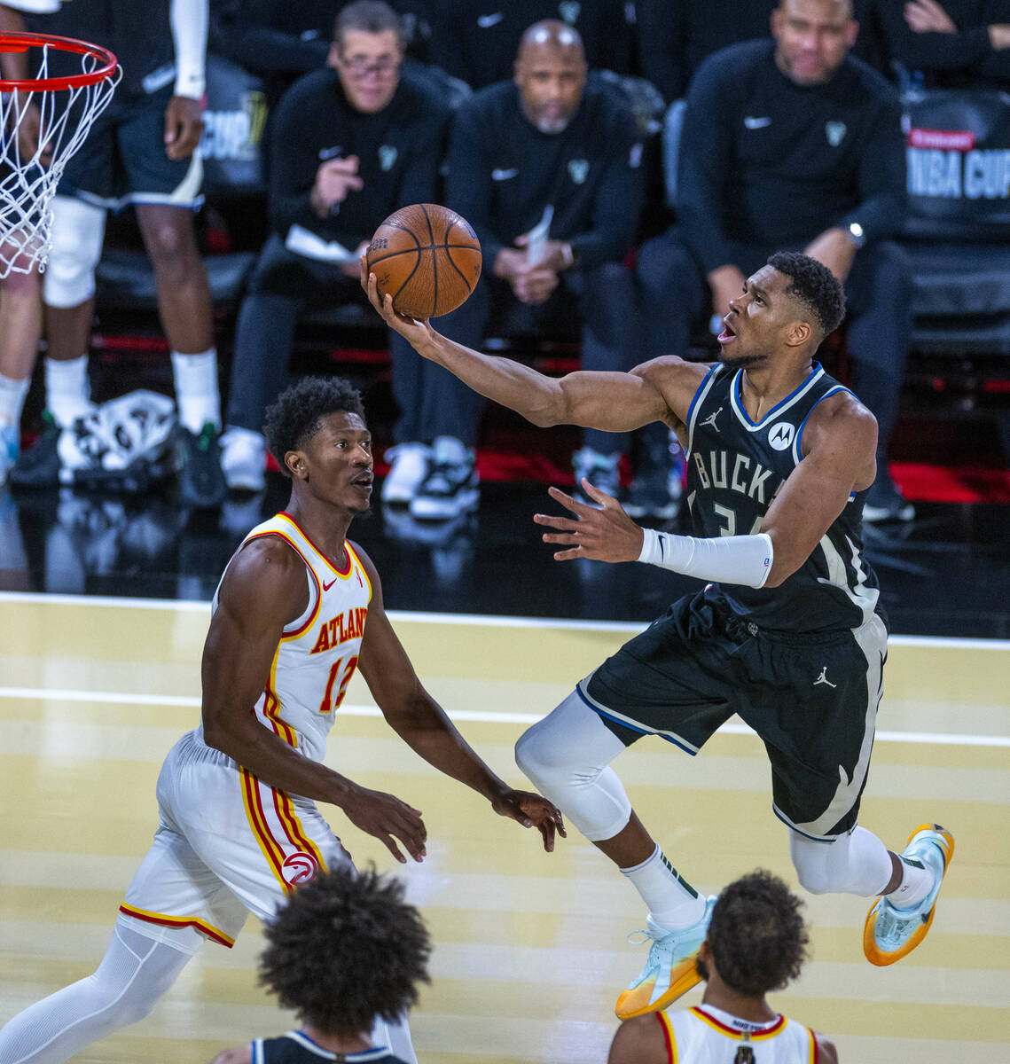 Milwaukee Bucks forward Giannis Antetokounmpo (34) soars to the basket for a score as Atlanta H ...