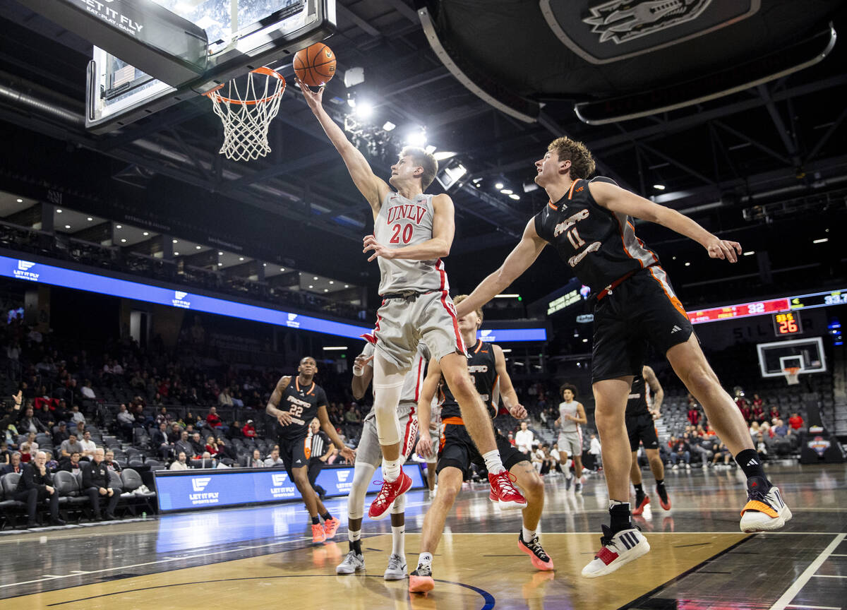 UNLV guard Julian Rishwain (20) attempts a layup during the Jack Jones Classic college basketba ...