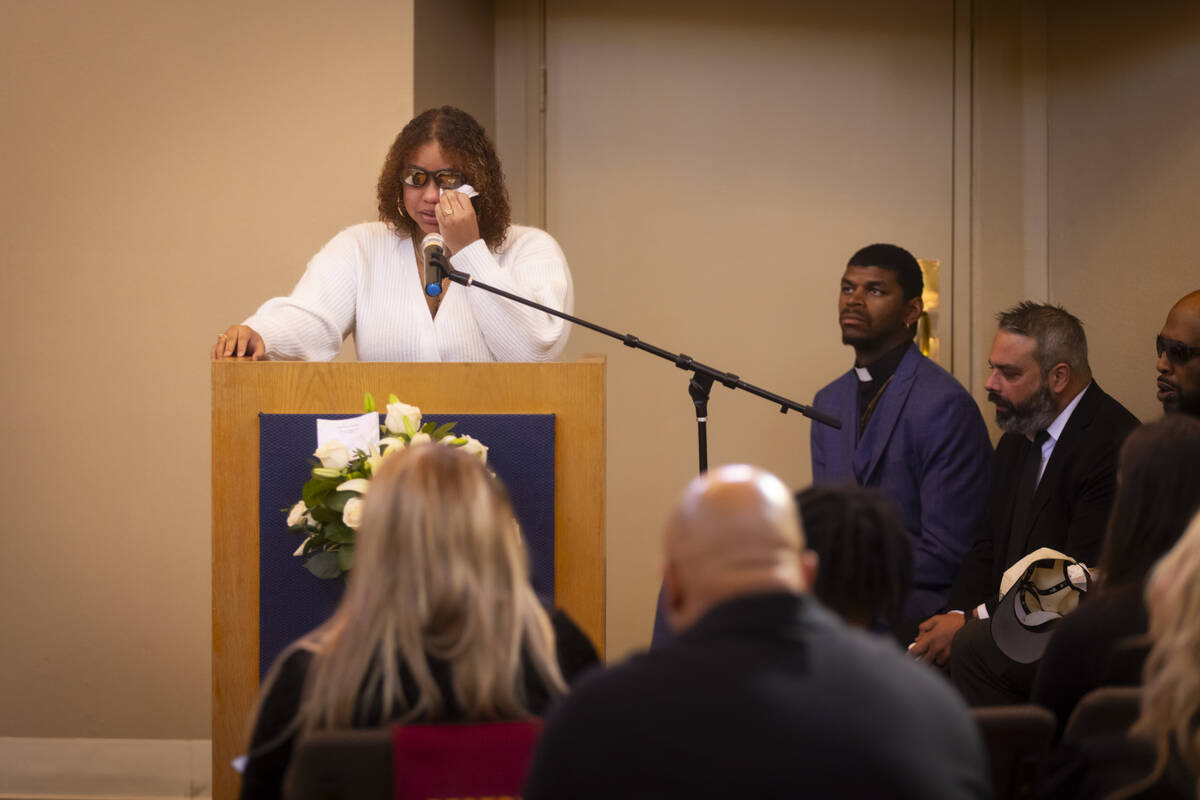 Isabella Durham talks about her late father, Brandon Durham, during the funeral service at Davi ...