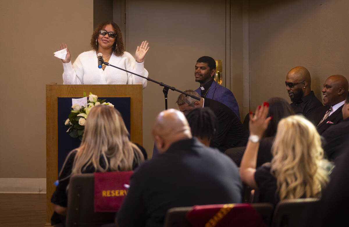 Isabella Durham talks about her late father, Brandon Durham, during the funeral service at Davi ...