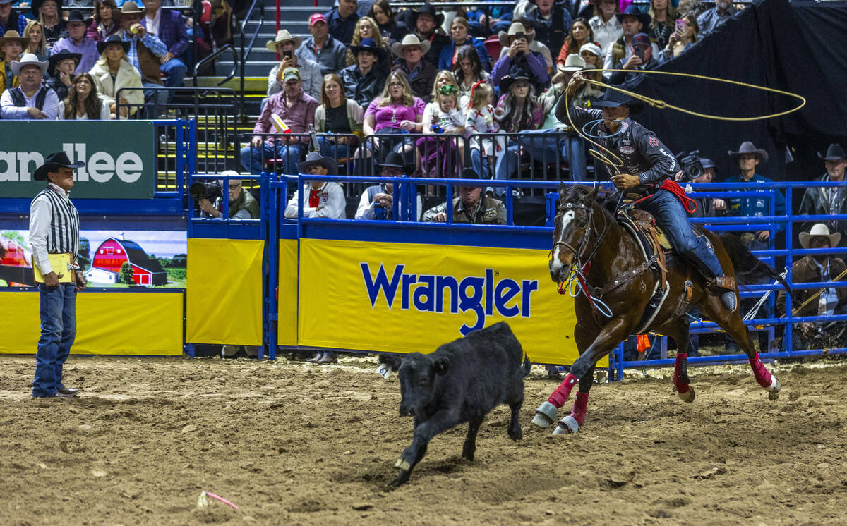 Tie-Down Roping competitor Shad Mayfield eyes his calf during National Finals Rodeo Day 2 at th ...