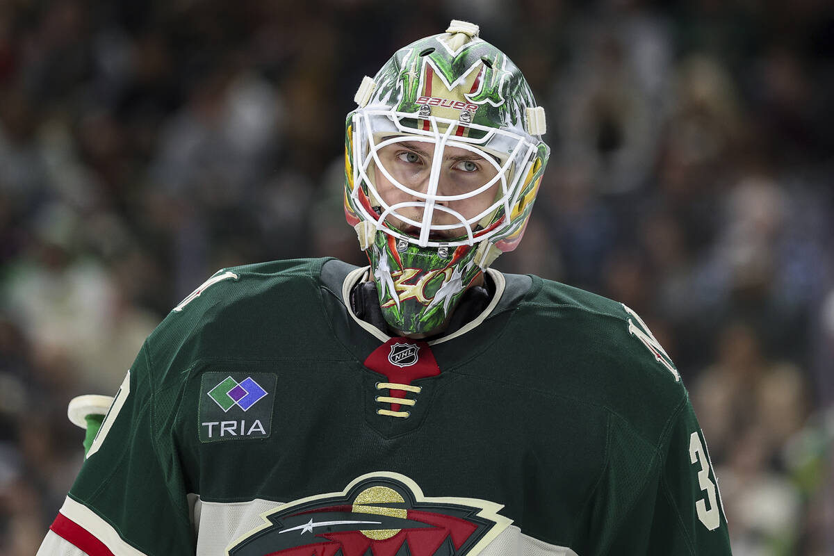 Minnesota Wild goaltender Jesper Wallstedt (30) looks on during the second period of an NHL hoc ...