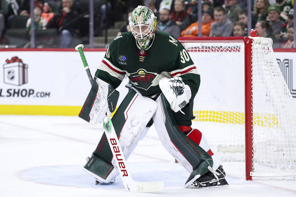 Minnesota Wild goaltender Jesper Wallstedt (30) defends his net during the second period of an ...