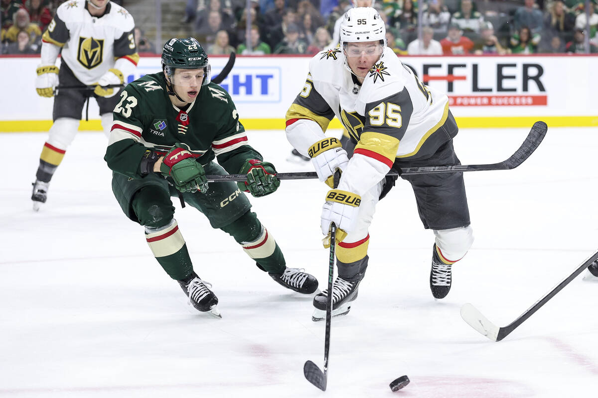 Vegas Golden Knights right wing Victor Olofsson, right, and Minnesota Wild center Marco Rossi ( ...