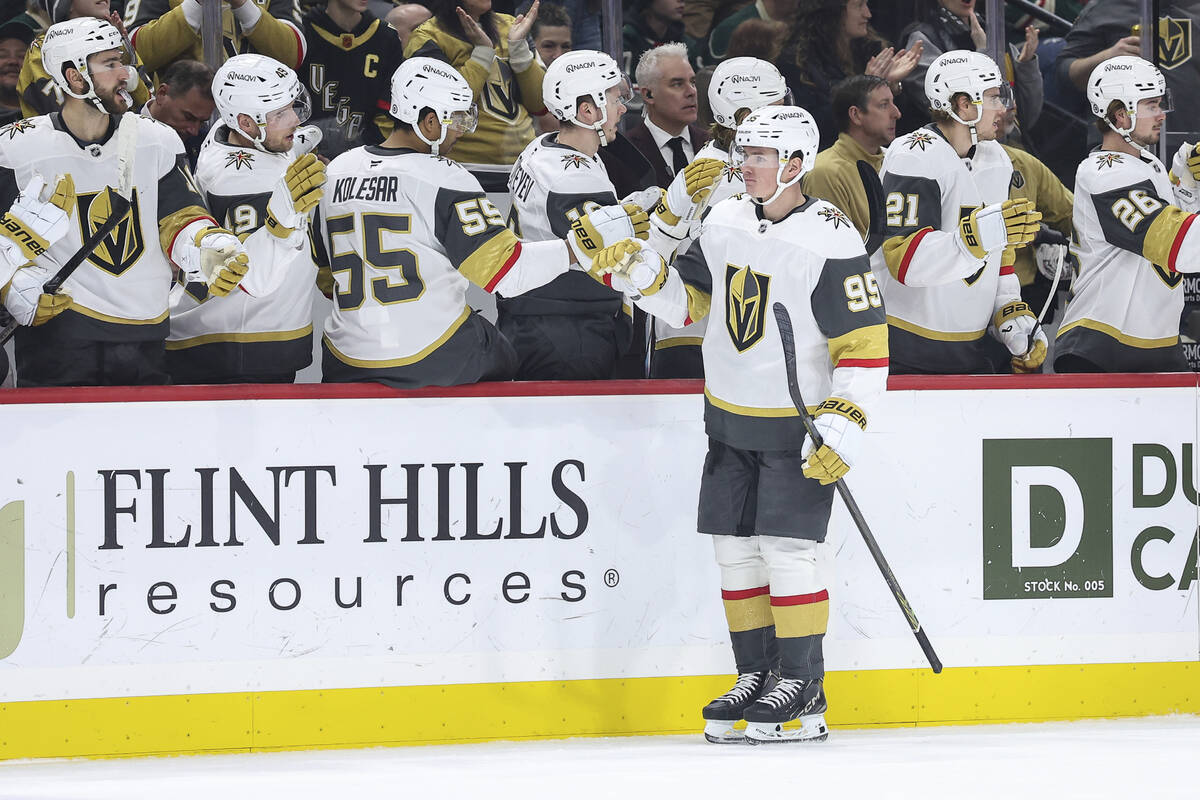 Vegas Golden Knights right wing Victor Olofsson (95) is congratulated after his power-play goal ...