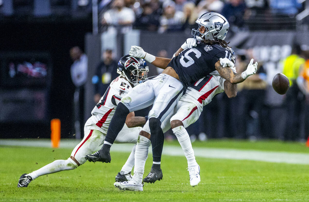 Raiders wide receiver Jakobi Meyers (16) is stripped of a pass reception by Atlanta Falcons cor ...