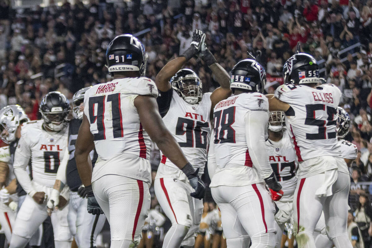 Atlanta Falcons defensive end Zach Harrison (96) celebrates recording a safety against the Raid ...