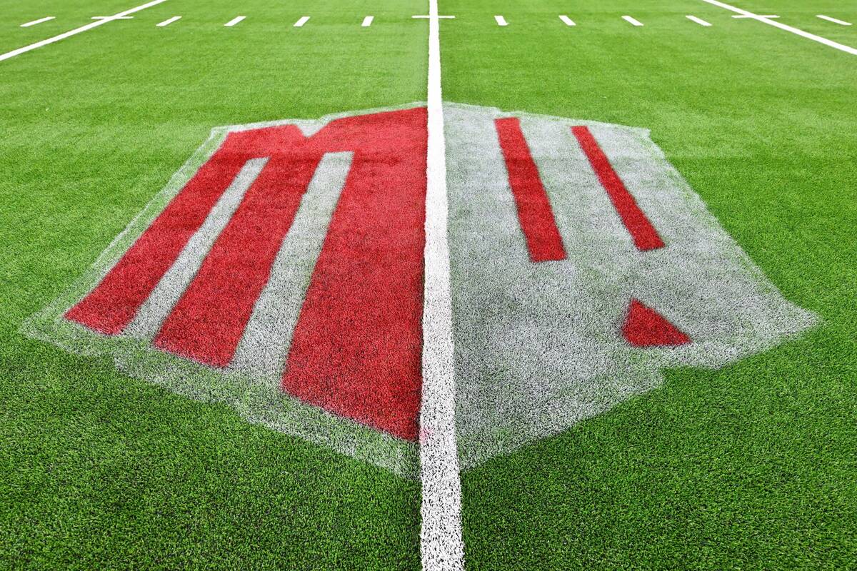 A Mountain West logo is seen on the field before an NCAA college football game between UNLV and ...