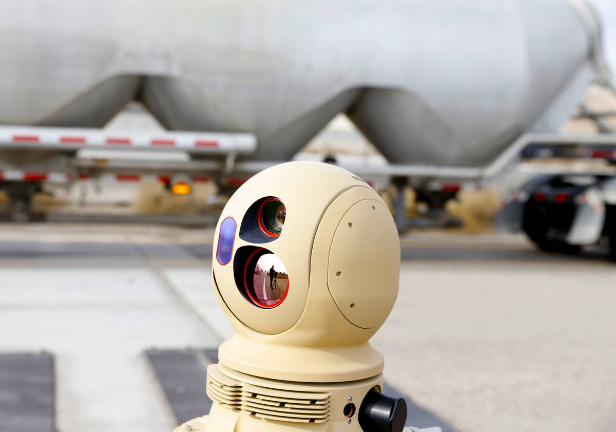 A truck drives past a thermal imaging camera at the Sloan Truck Weigh Station during a demonstr ...