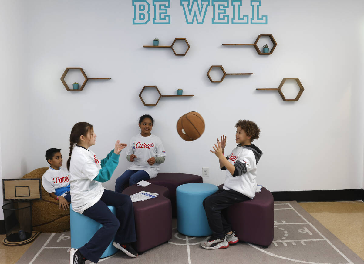 Children play after a ribbon cutting ceremony for Kim Reed Center at Bill and Lillie Heinrich Y ...