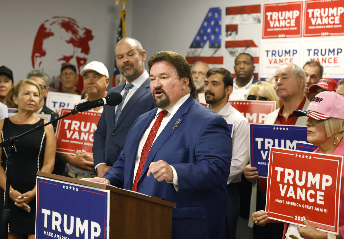 Nevada Republican Party Chairman Michael McDonald speaks as Clark County Republican Party Chair ...