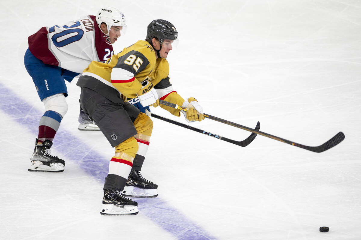 Colorado Avalanche center Ross Colton (20) and Vegas Golden Knights right wing Victor Olofsson ...