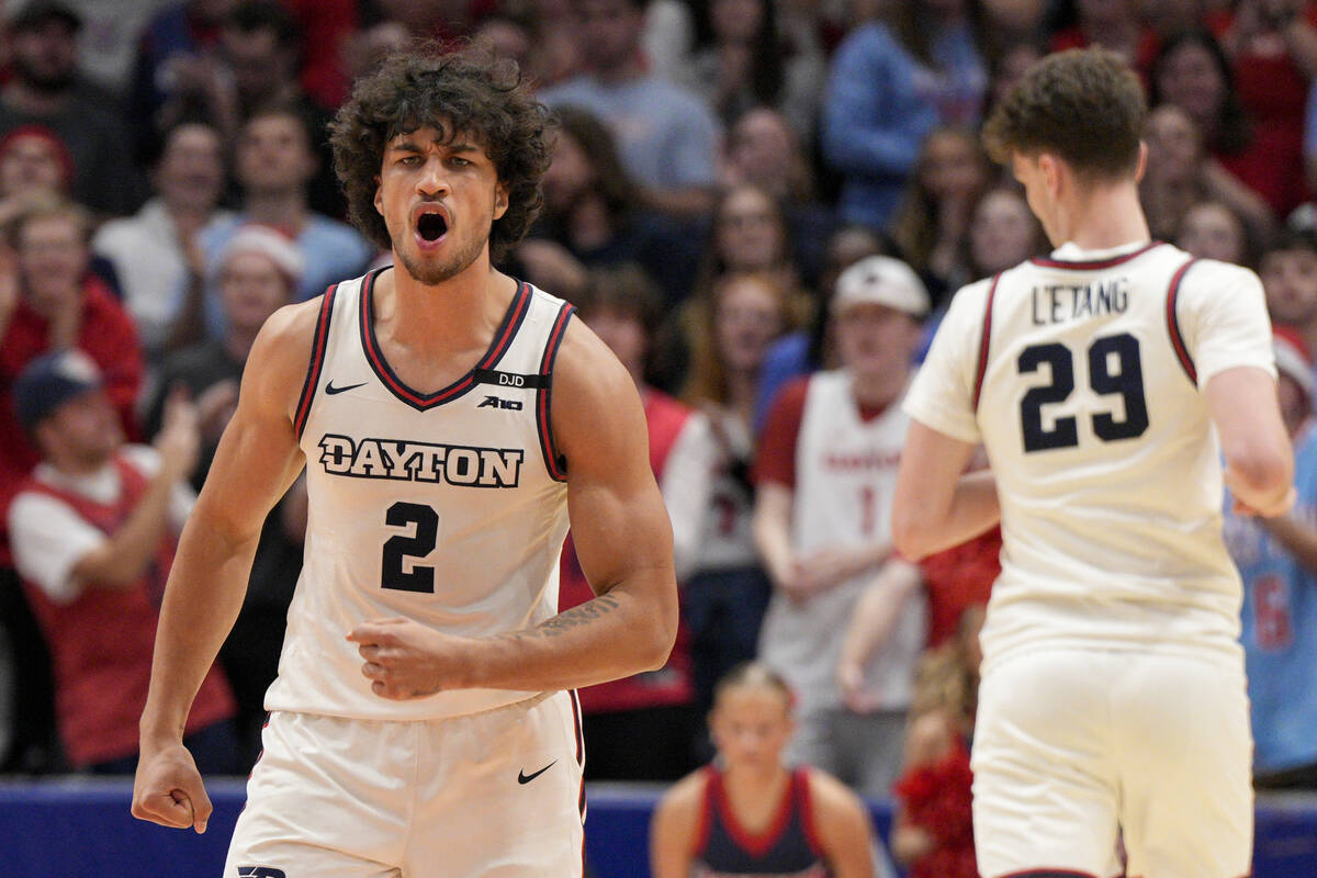 Dayton's Nate Santos (2) reacts during the second half of an NCAA college basketball game again ...