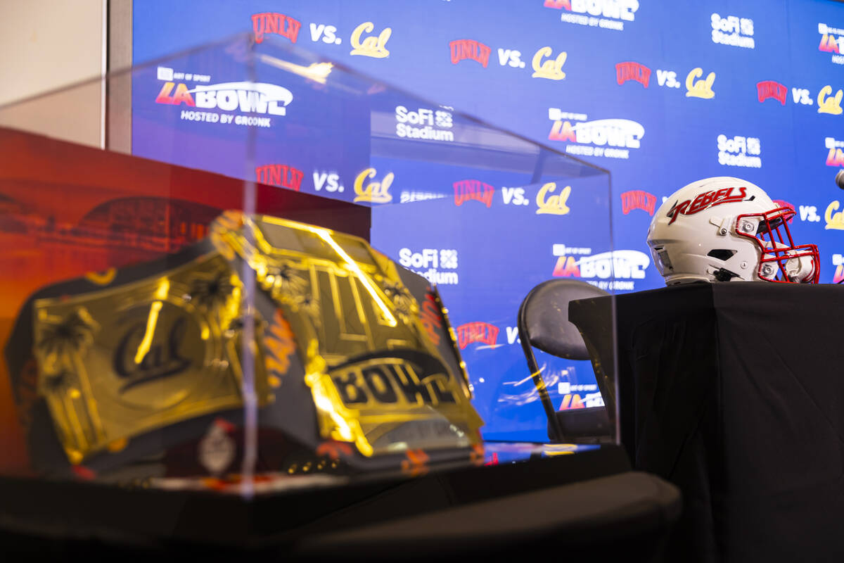 The LA Bowl trophy, styled as a championship belt, is seen before a press conference at SoFi St ...