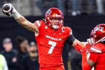 UNLV linebacker Jackson Woodard (7) celebrates after scooping a fumble and scoring a touchdown ...