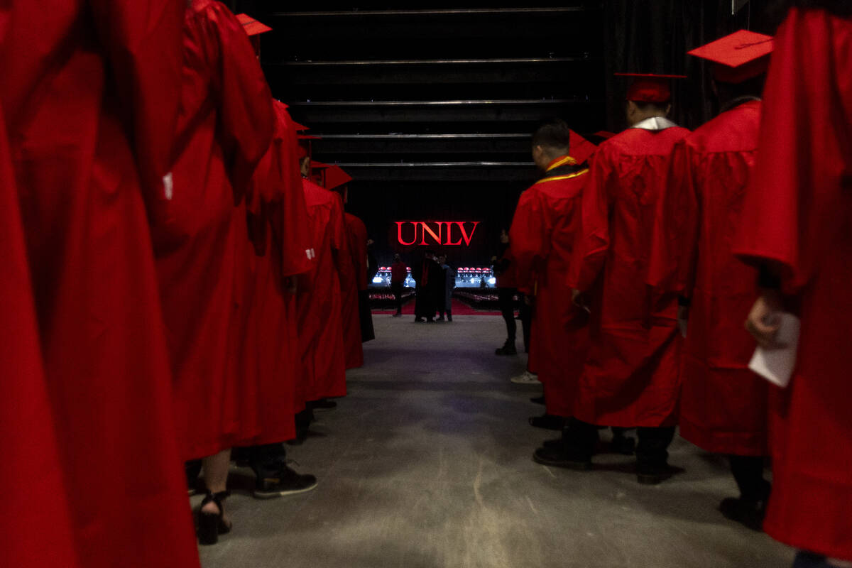 Graduates wait to enter the floor before the UNLV winter commencement at the Thomas & Mack ...