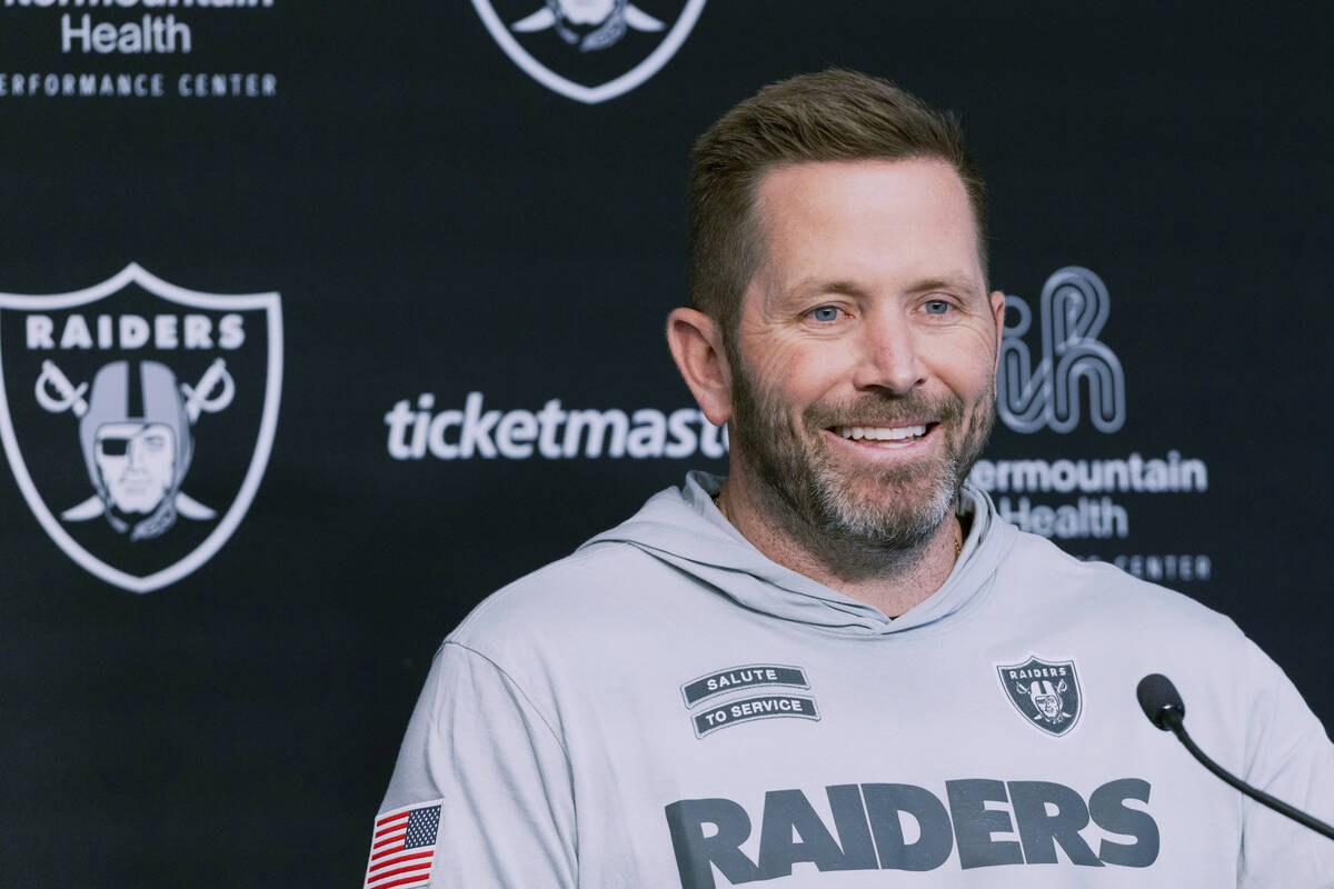 Raiders interim offensive coordinator Scott Turner smiles during a news conference on Thursday, ...