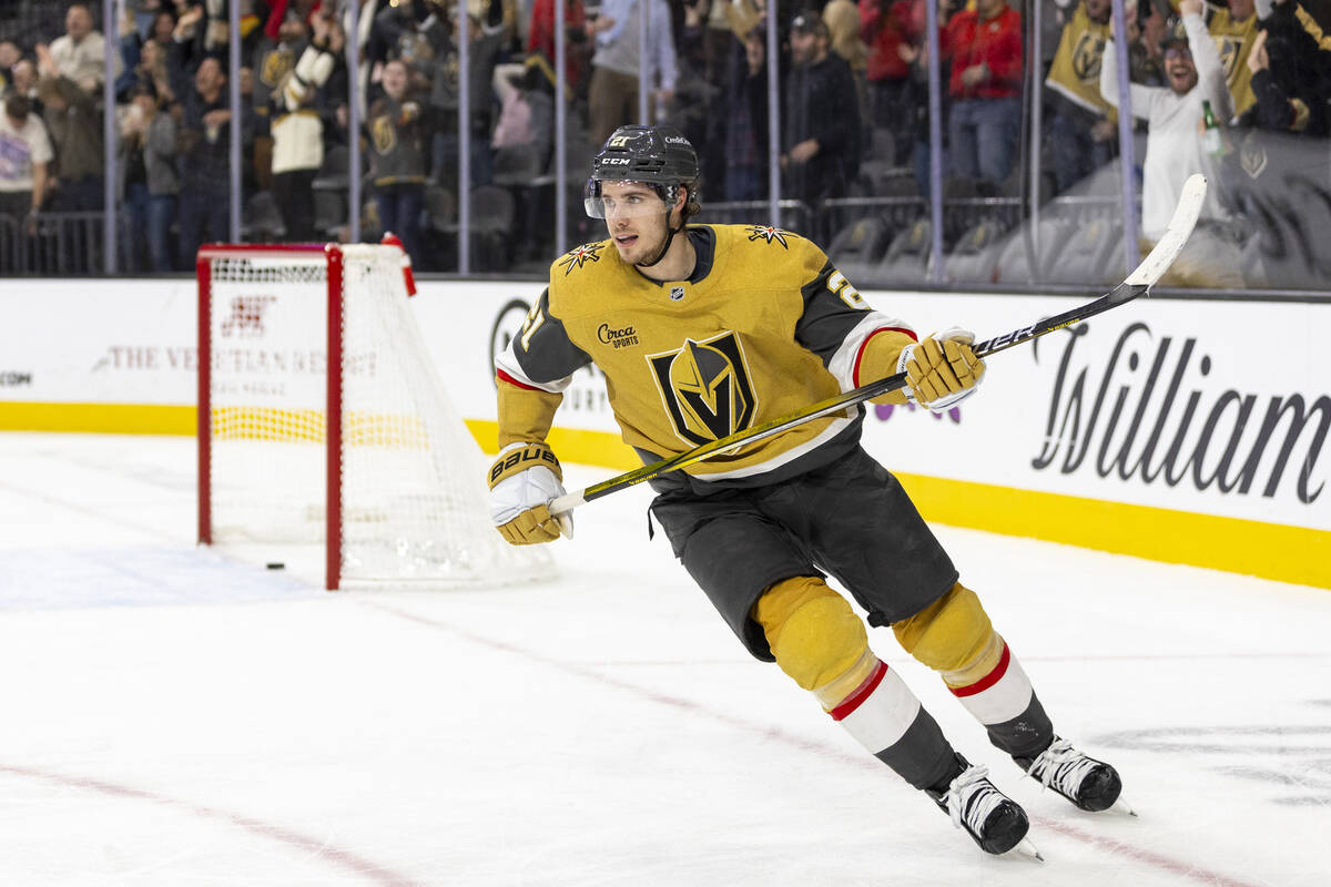 Golden Knights center Brett Howden (21) celebrates after scoring an empty net goal during the t ...