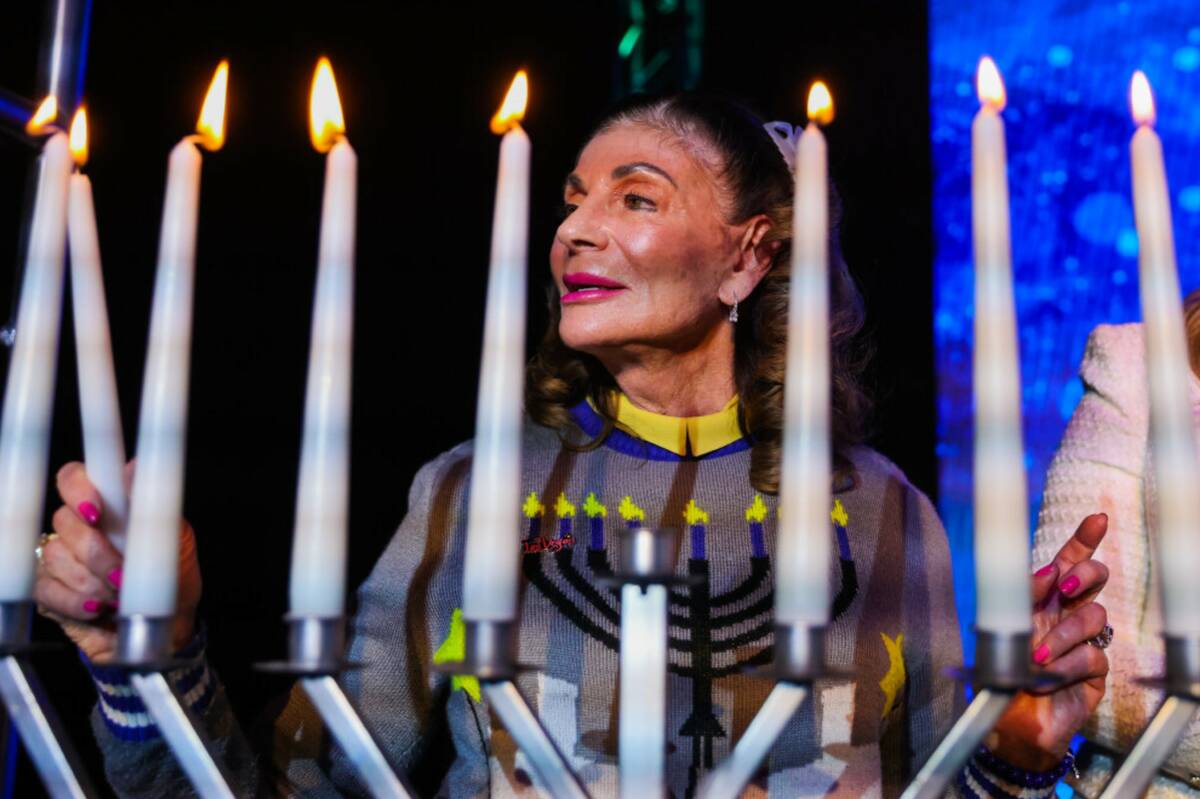 Las Vegas Mayor Shelley Berkley lights a menorah at an event hosted by the Israeli American Cou ...