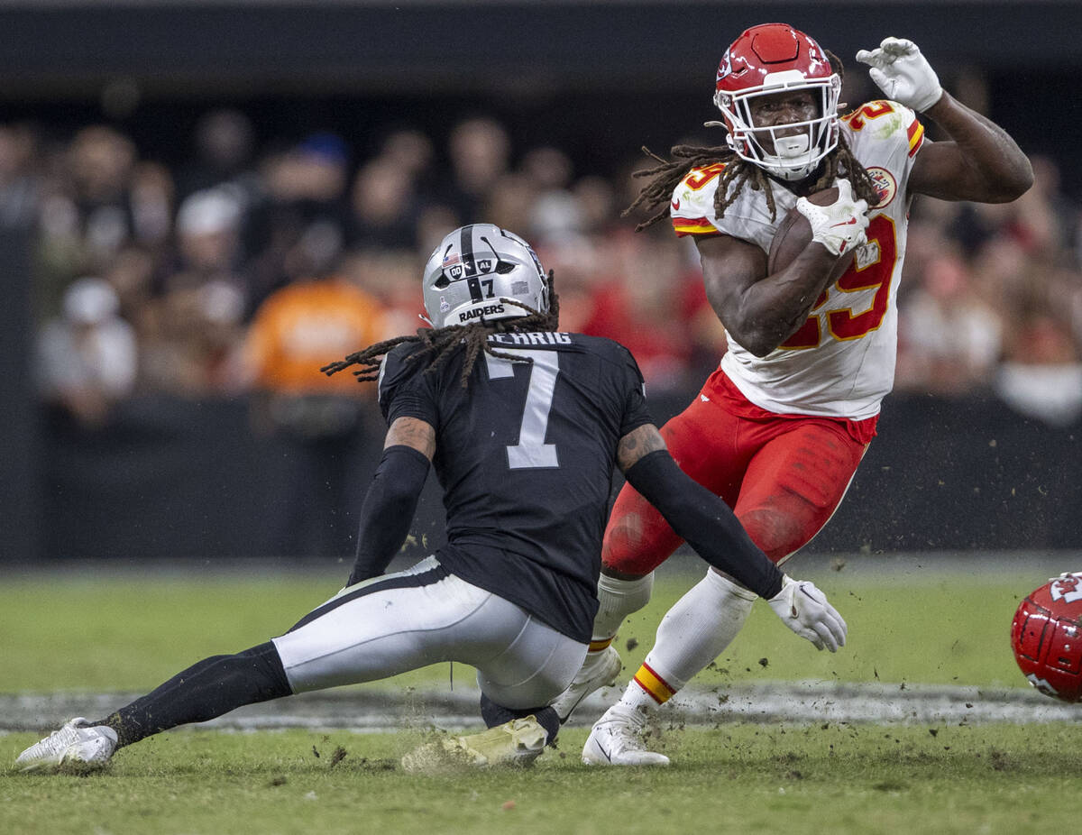 Raiders safety Tre'von Moehrig (7) dives for a tackle on Kansas City Chiefs running back Kareem ...