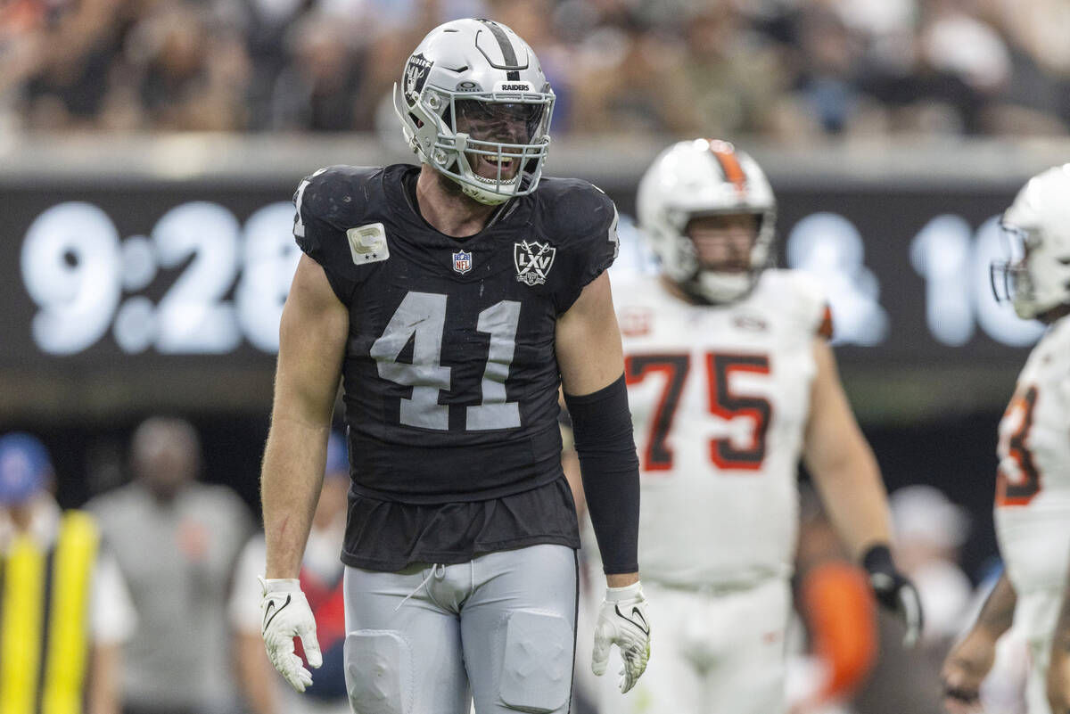 Raiders linebacker Robert Spillane (41) smiles on the field during the first half of an NFL gam ...