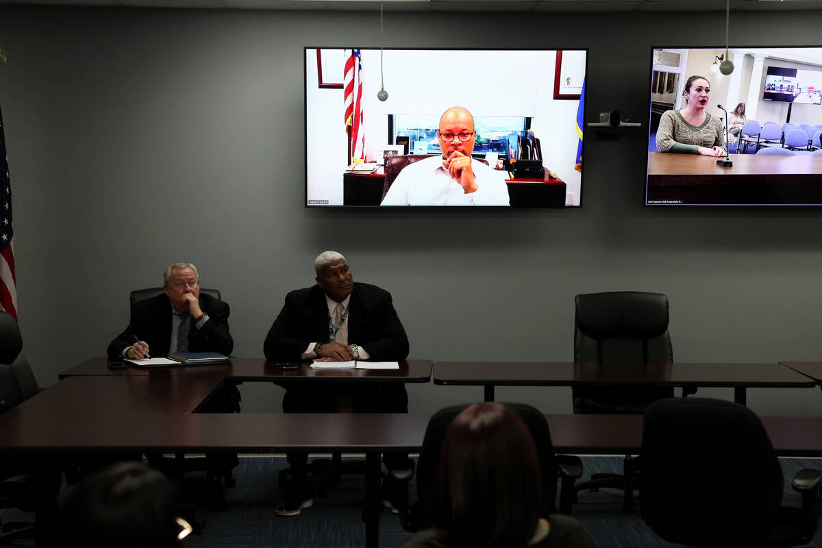 Morgan Darcy, right, speaks from Carson City during the public comment period of a Board of Sta ...