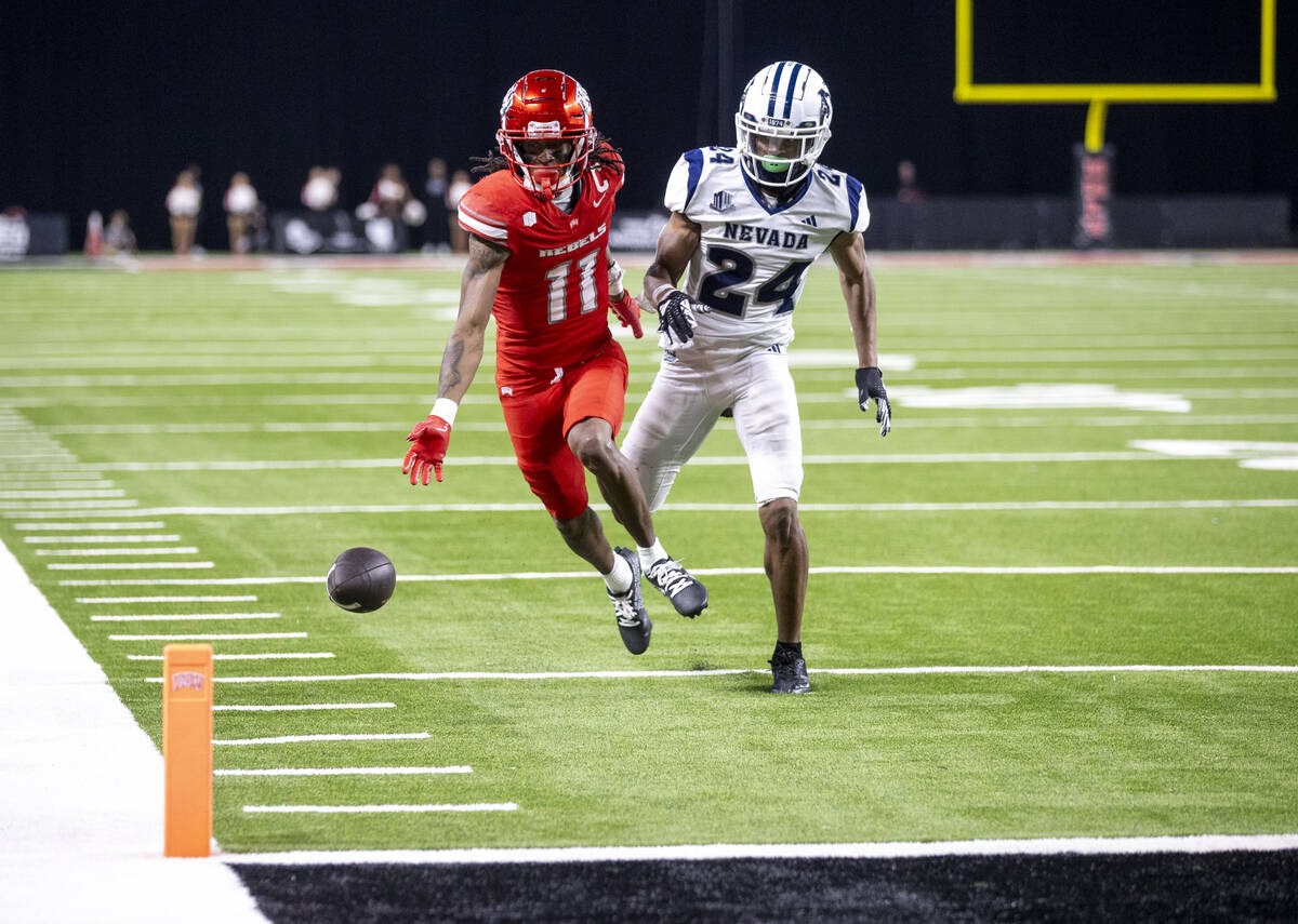 UNLV wide receiver Ricky White III (11) runs after an overthrown pass during the NCAA college f ...