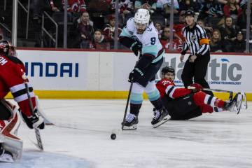 Seattle Kraken center Chandler Stephenson (9) shoots during the first period of an NHL hockey g ...