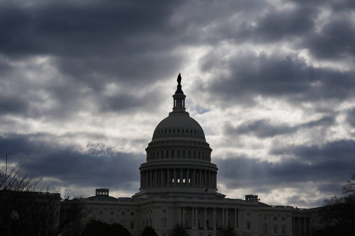 FILE - The Capitol in Washington, is framed by early morning clouds, March 19, 2024. Congress h ...