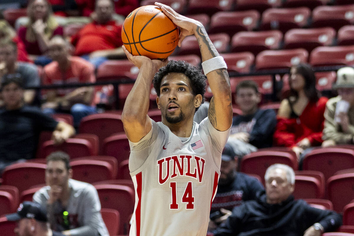 UNLV guard Jailen Bedford (14) attempts a three-point shot during the second half of the colleg ...