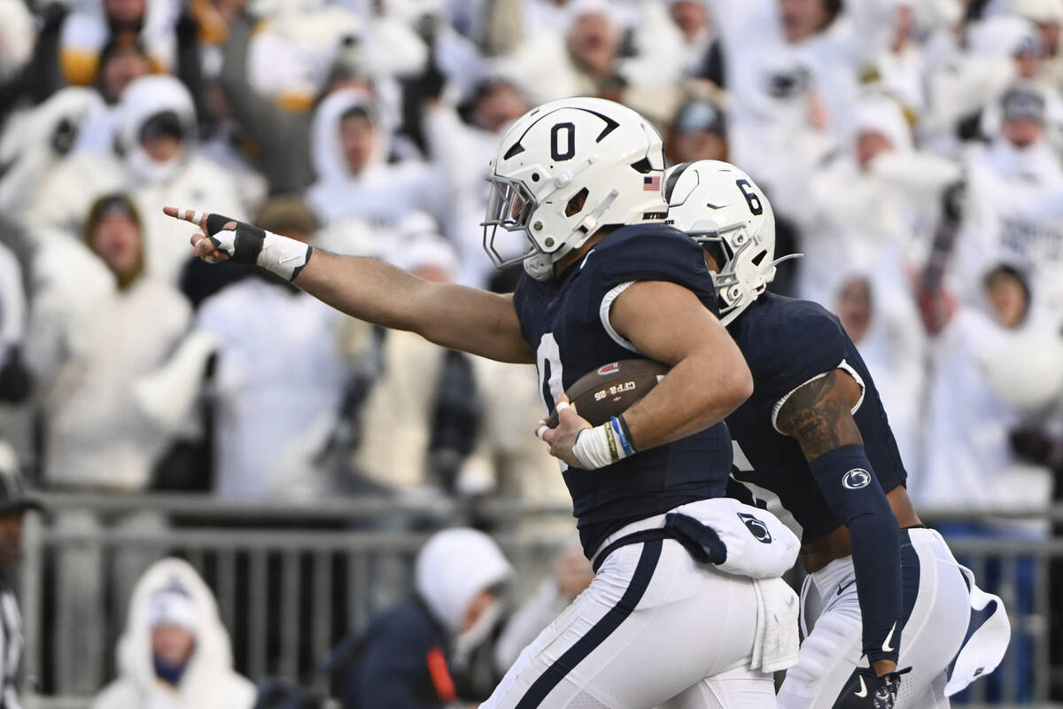 Penn State linebacker Dominic DeLuca celebrates an interception for a touchdown against SMU dur ...