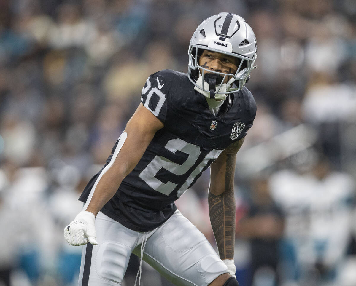 Raiders safety Isaiah Pola-Mao (20) in coverage on the field during the first half of an NFL ga ...