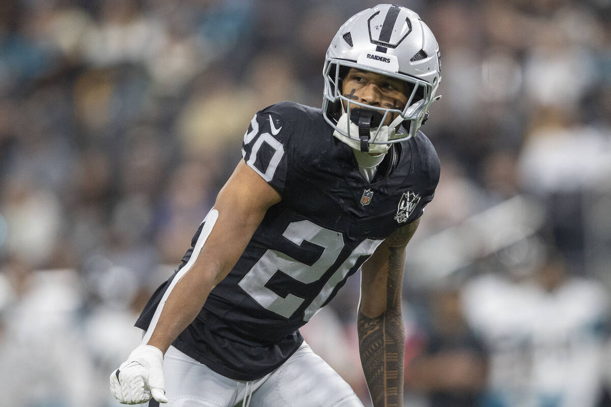 Raiders safety Isaiah Pola-Mao (20) in coverage on the field during the first half of an NFL ga ...