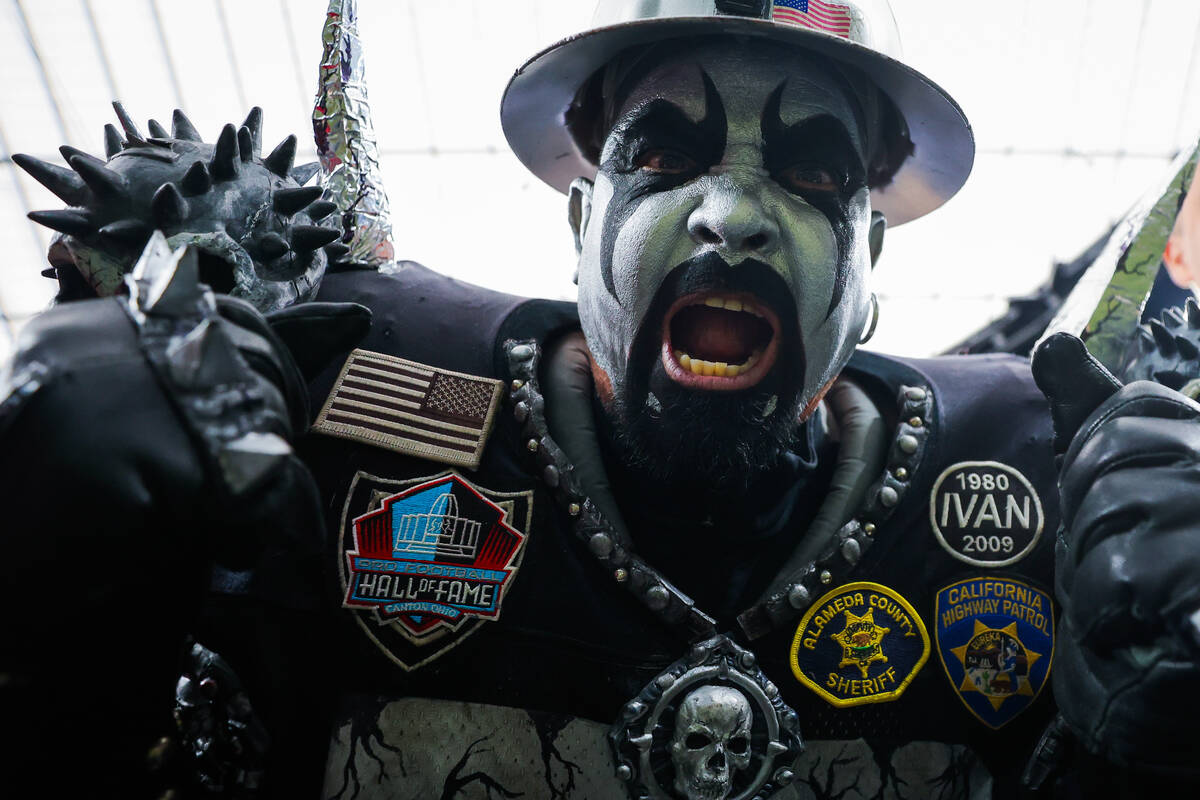 A Raiders fan gets pumped before an NFL football game between the Raiders and the Jacksonville ...